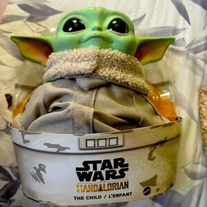 Star Wars, the Mandalorian, the child